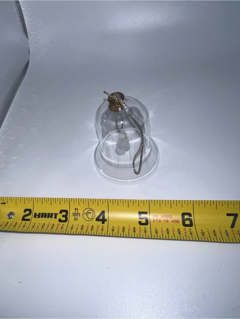 Small glass bell with angel
